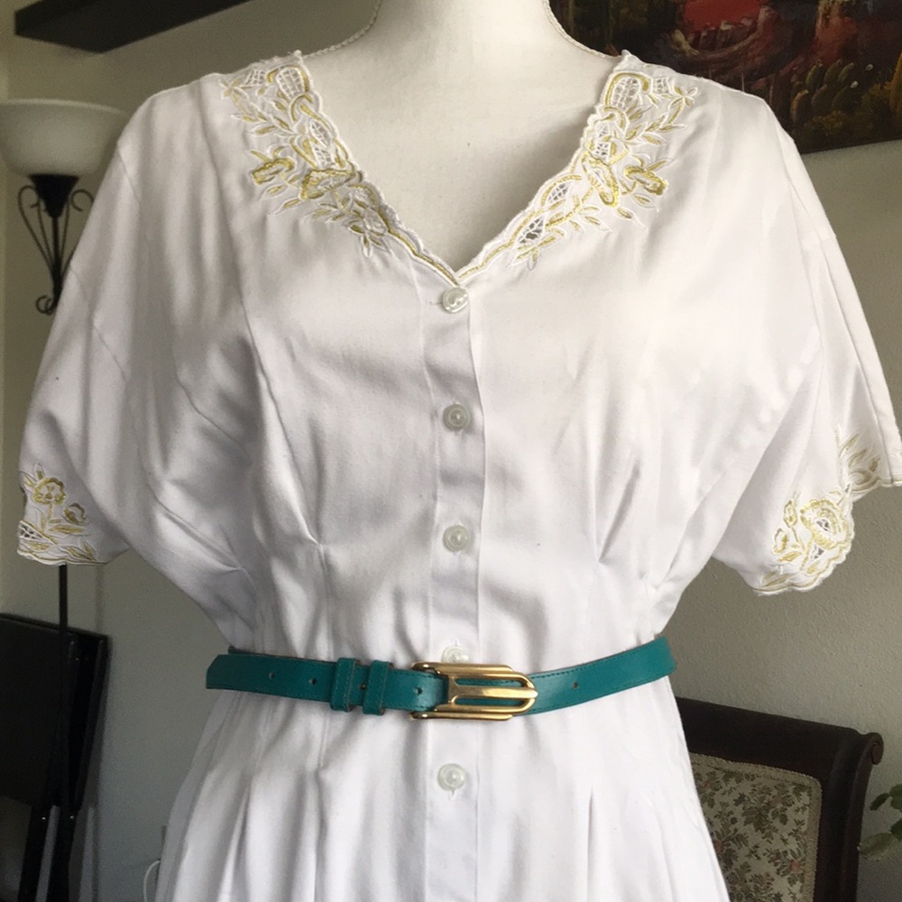 Teal belt with gold buckle